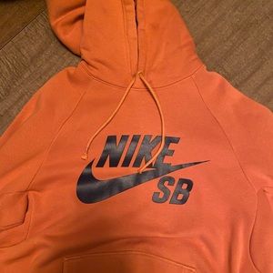 Orange Rust colored Nike hoodie